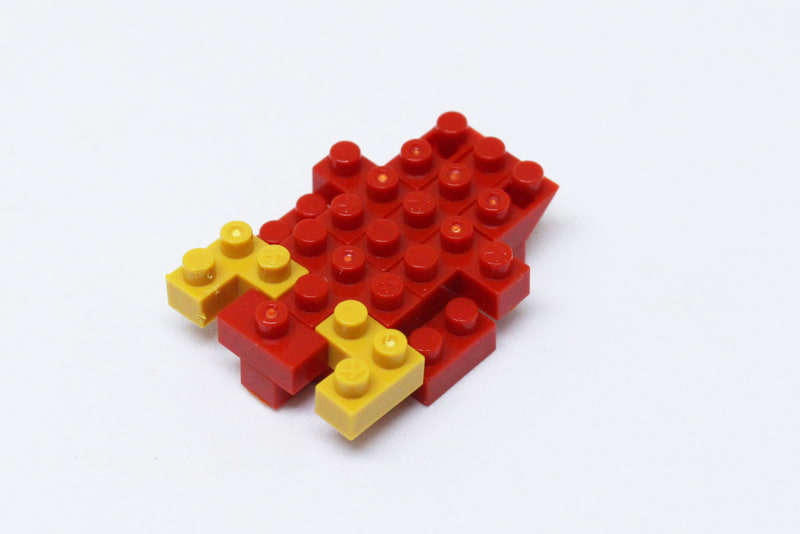 正しくブロックを重ねれば上下のブロックは固定されるので、これにさらにブロックを組んでいく