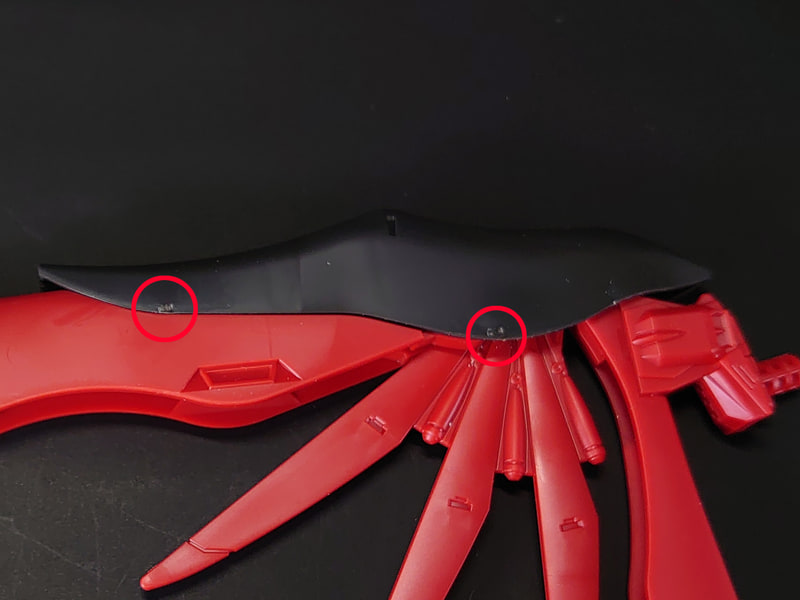 ゲート白化のお手軽処理方法その2……ツメで白くなったゲート跡をこすると、この写真程度には目立たなくなります。「これはちょっとひどいなあ」というときにお試しを