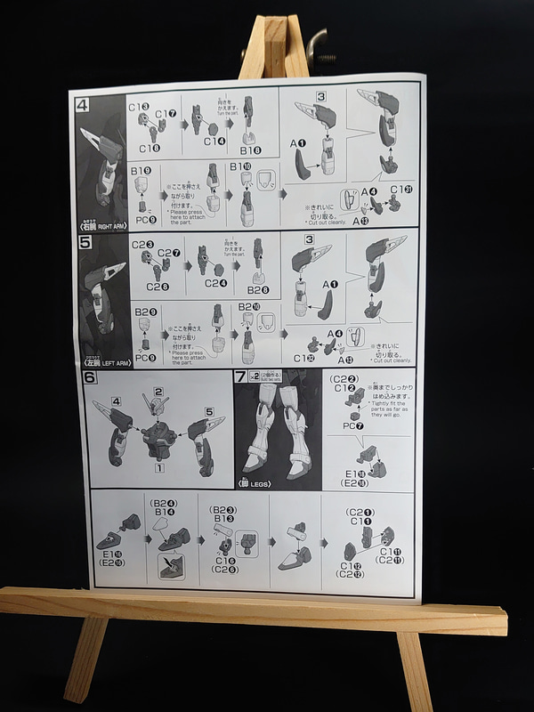 100均ショップで購入したイーゼルに説明書を立てかけることで、スペースを節約できます