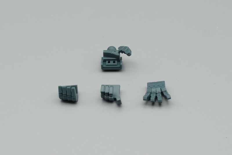 右手は可動する親指以外のパーツを取り替えることで持ち手を変更できる