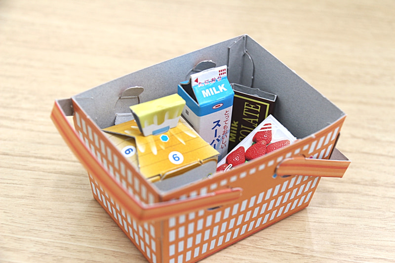 商品をかごに入れて