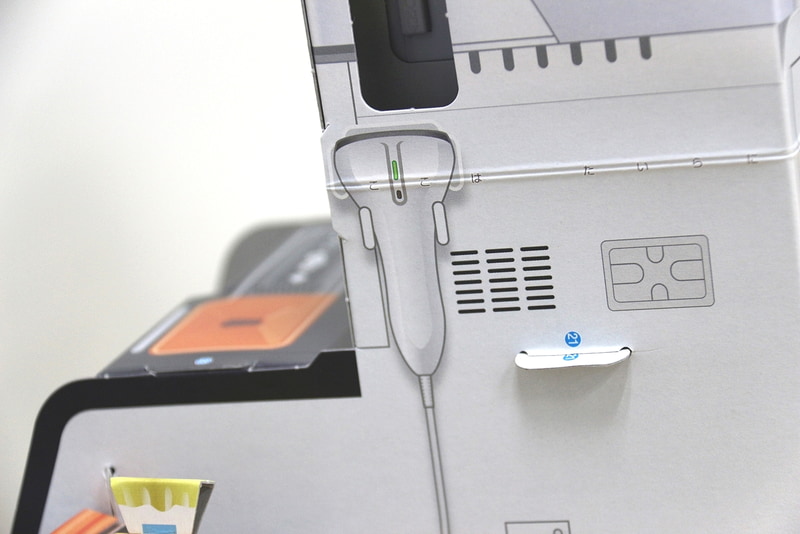 スキャナーはレジの側面に印刷されていた