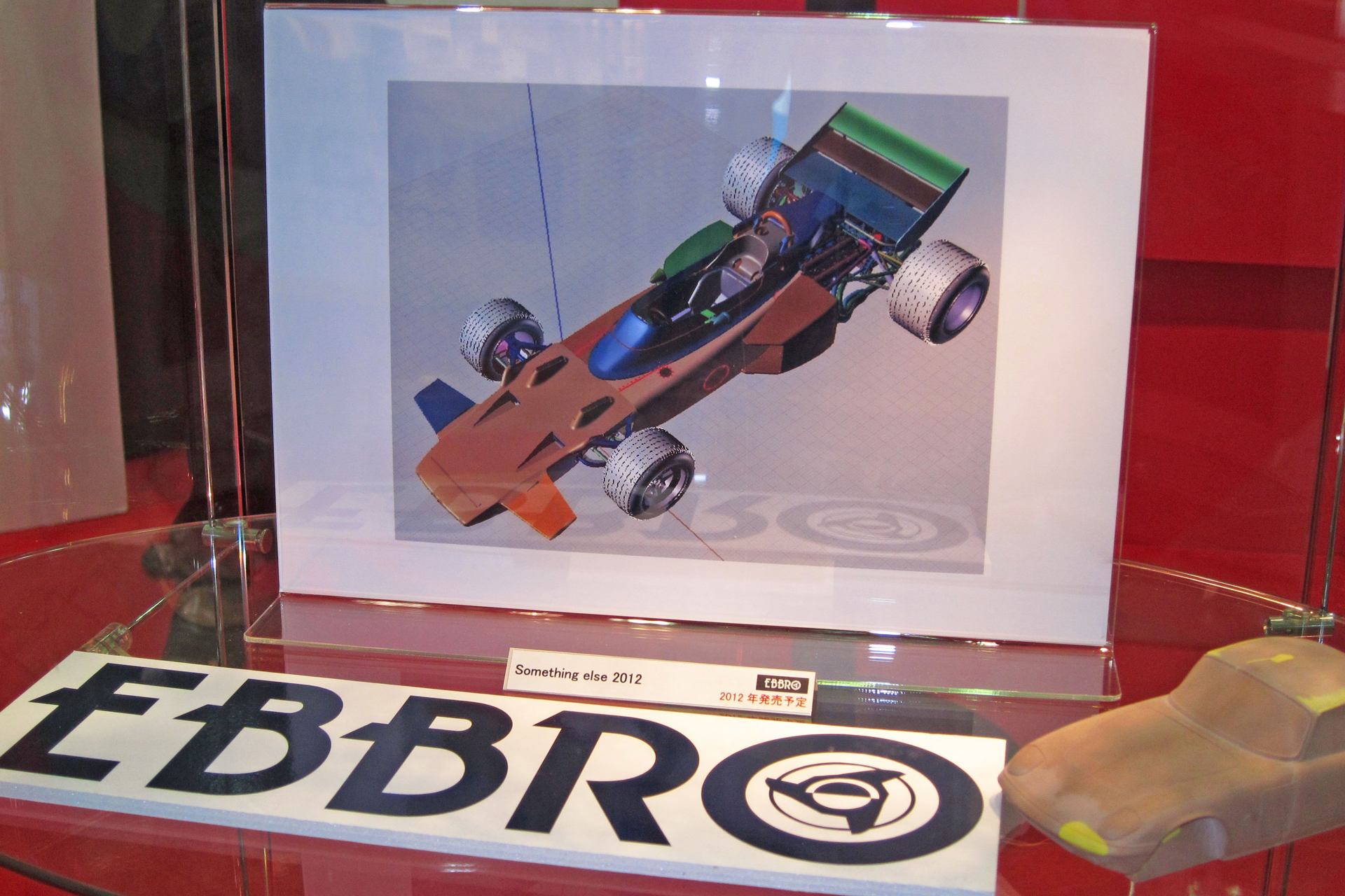 「第51回 全日本模型ホビーショー」会場にて、パネル展示のみにて発表されたLOTUS type 72C 1970（ロータス72C）の1/20 プラスチックモデル化。そこには「Something else 2012」（2012年発売予定の「ほかの何か」）としか記載されていなかったが、見る人が見ればこのマシンが「ロータス72C」の3D CAD設計データのプリントアウトであることは一目瞭然であった。と同時に、ダイキャスト製ミニチュアカーメーカーであるエブロが「ほかの何か」と語っていた以上、それがプラスチックモデルであることは明白であったと言えるだろう。ちなみにこの「Something else 2012」という巧妙な表記は、木谷氏の遊び心から生み出されたという