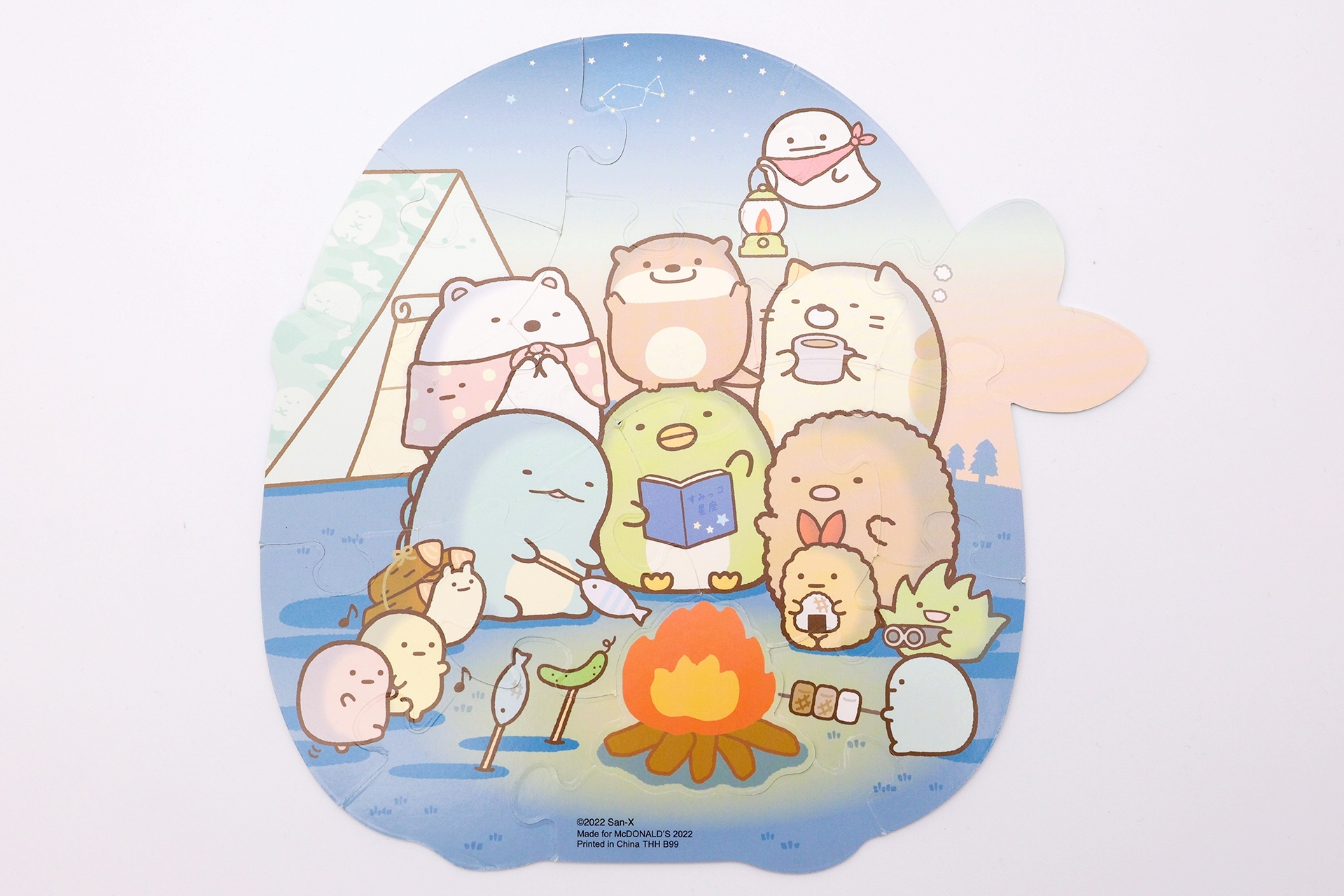 裏面のパズルを完成させると、夜にキャンプファイアーで食事を作っている場面が出来上がる