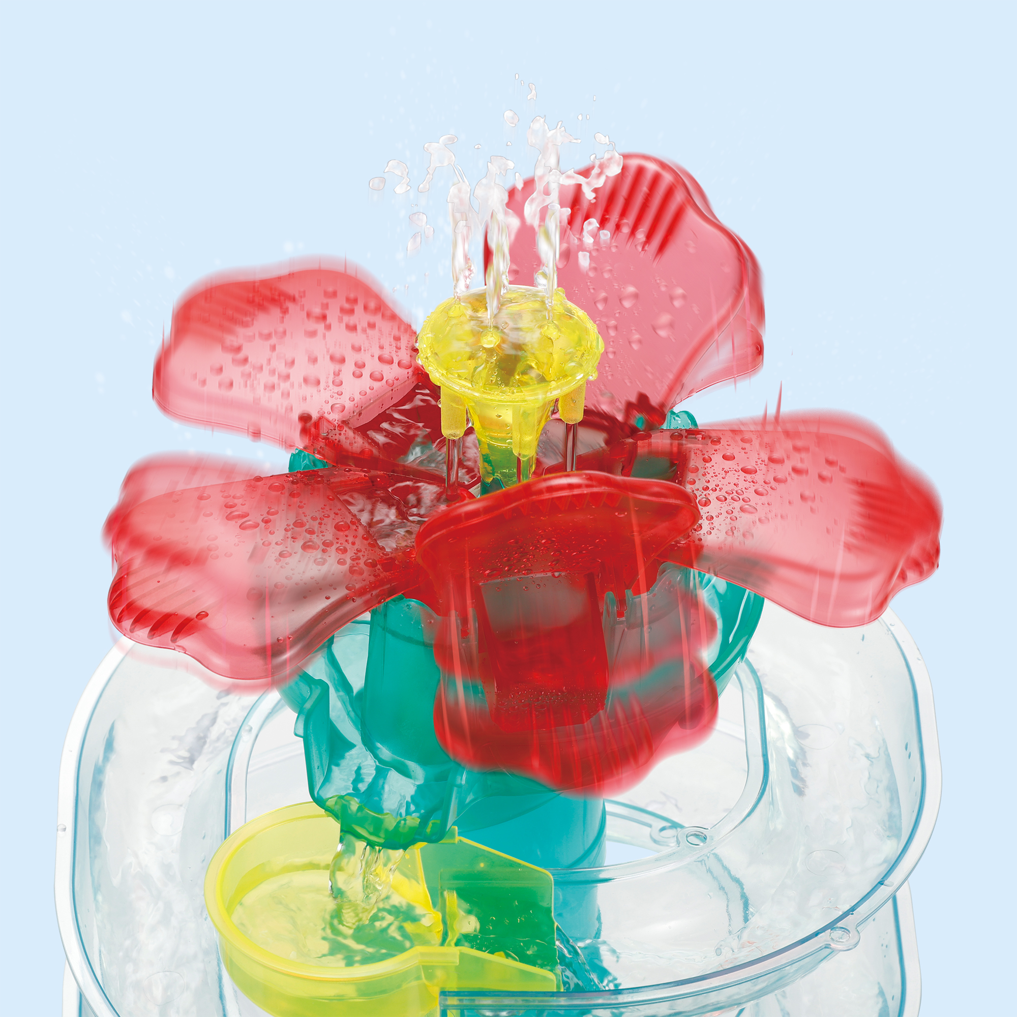スライダーの頂上で咲き誇る花の形をした噴水「ハイビスカスファウンテン」