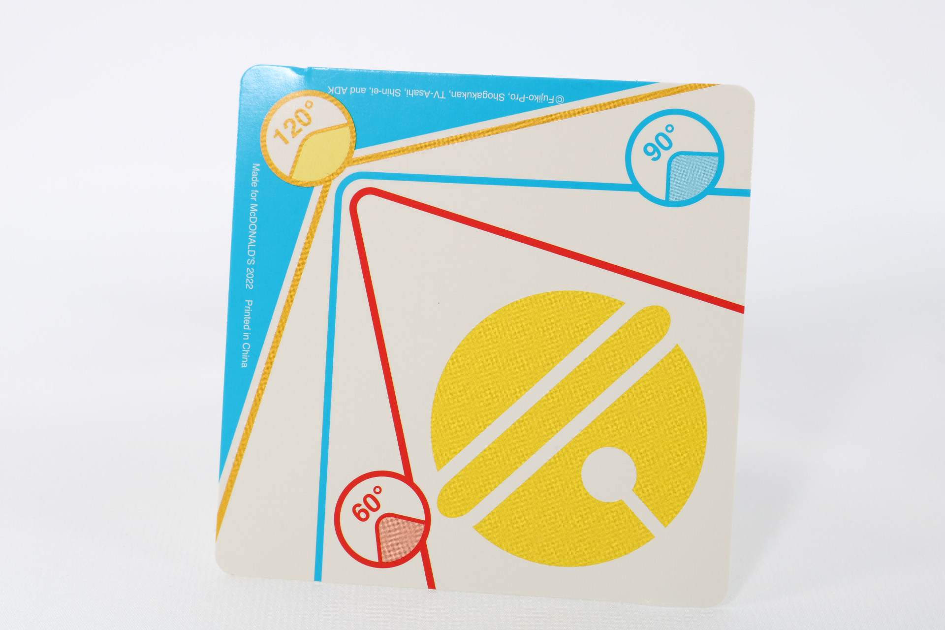 台紙には角度とドラえもんの鈴のイラストが描かれている