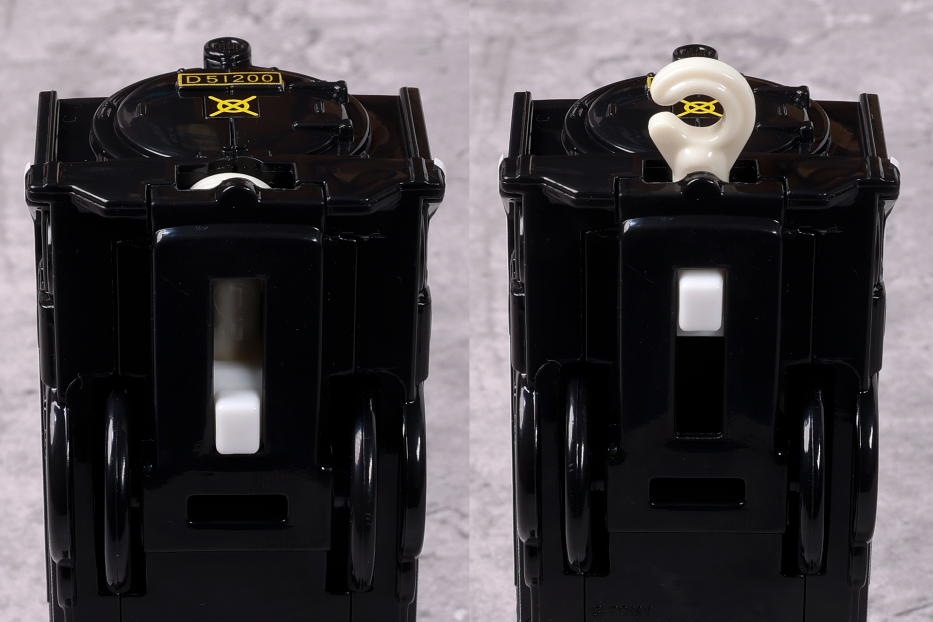 底面側には連結部分を引き出すためのボタンが用意されている