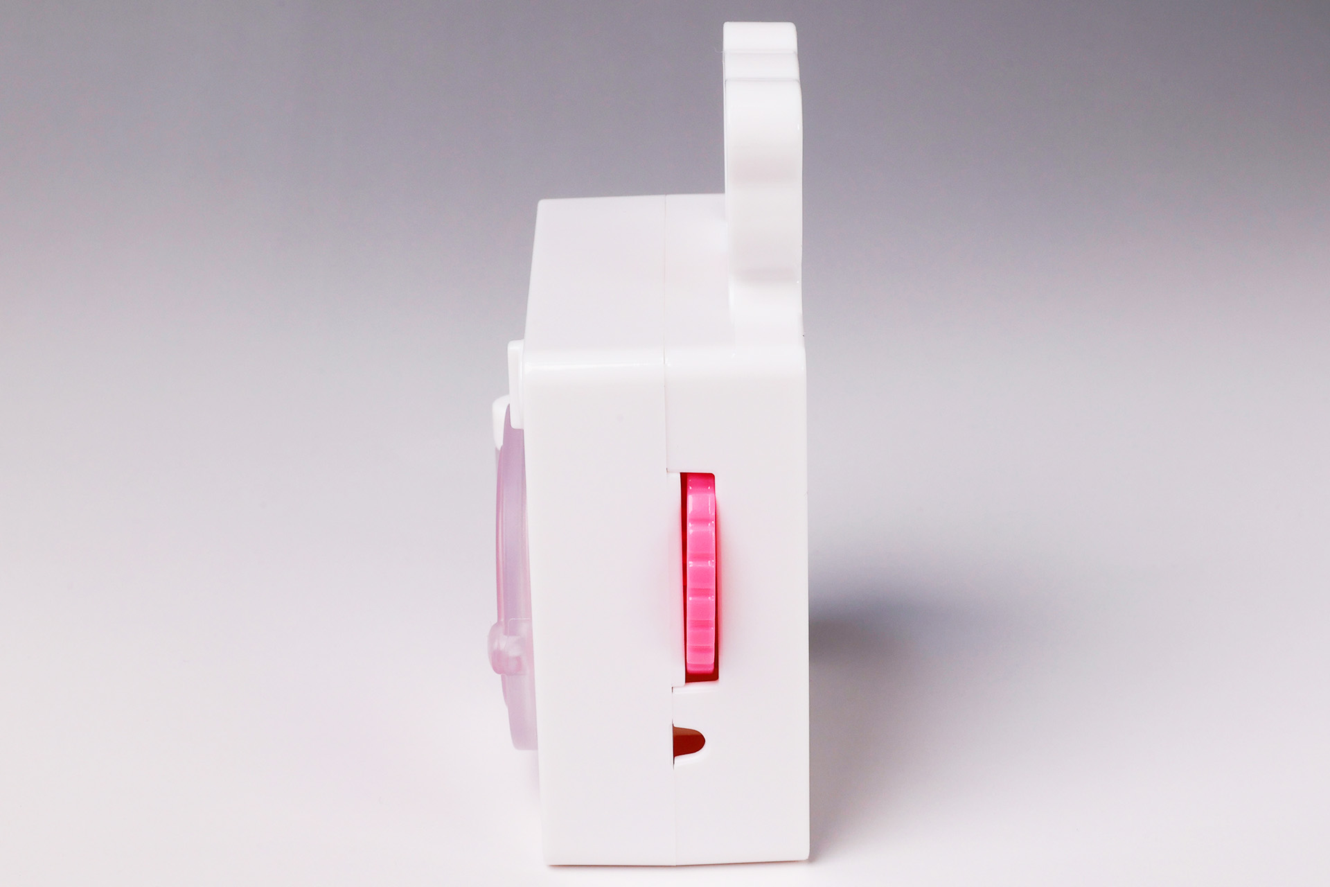 側面に付いているダイヤルを回すと洗濯機の中身が回る