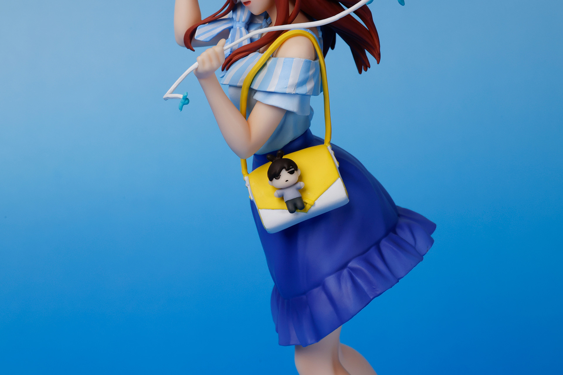 黄色いバッグには、風太郎をモチーフにしたマスコットが付けられている