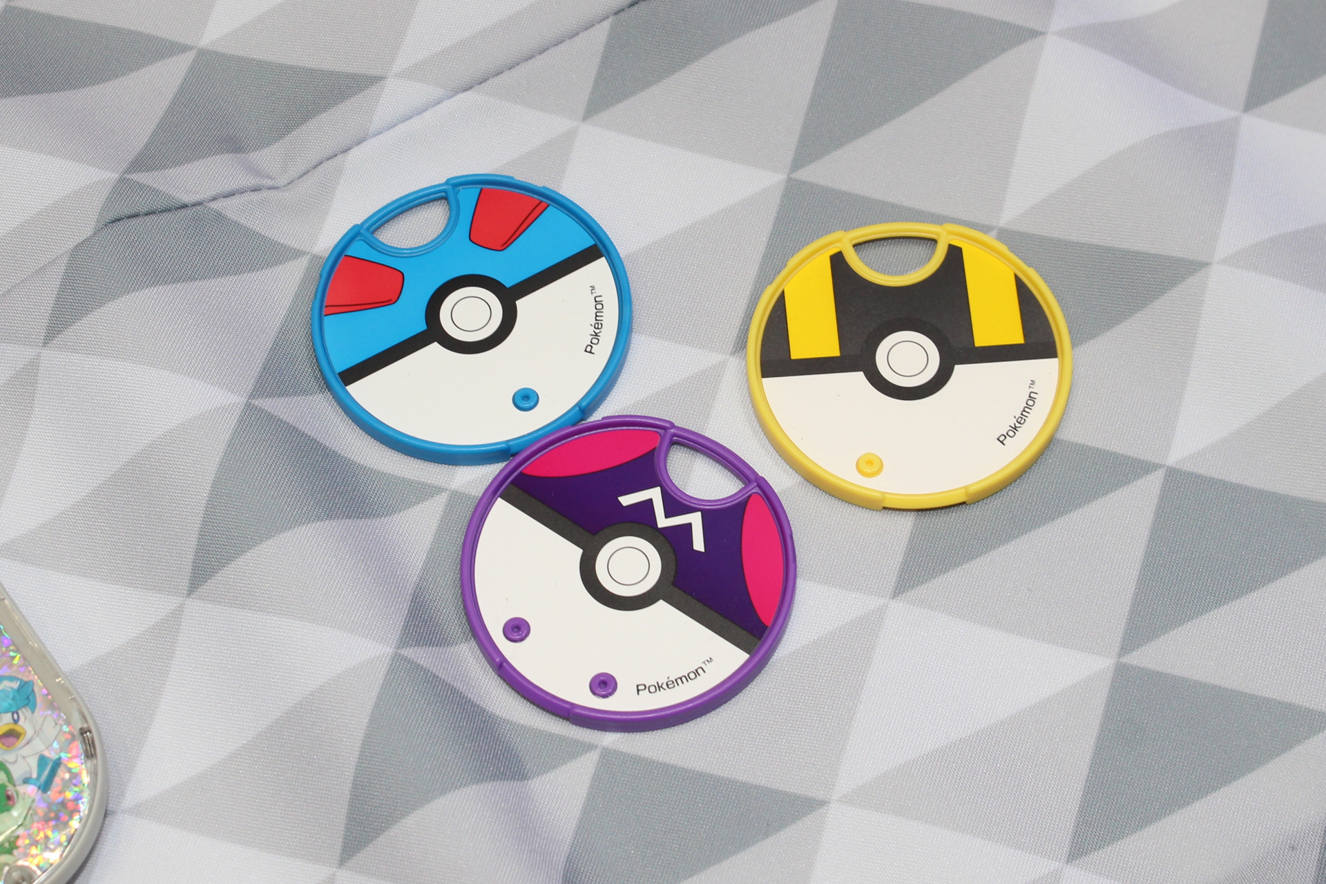 モンスターボールの形をした「ポケIDタグ」。難易度の選択などに使用する