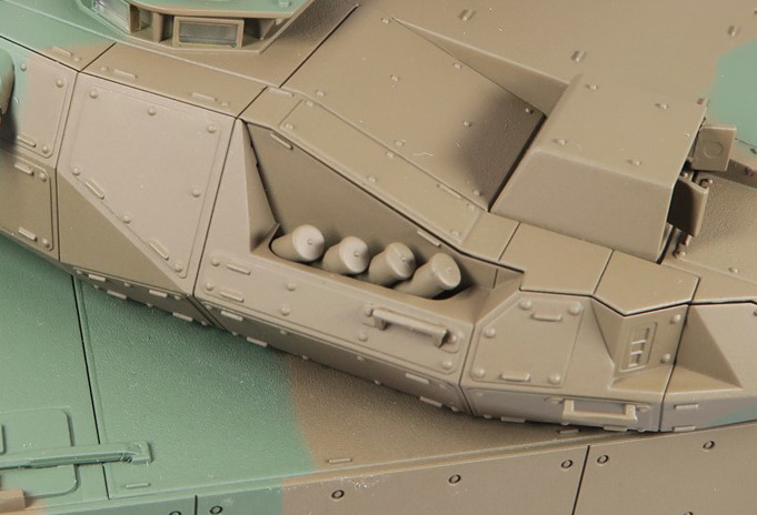 スモークディスチャージャーは一つずつ基礎パーツに接着したあと、砲塔のサイドパネルに組み付ける