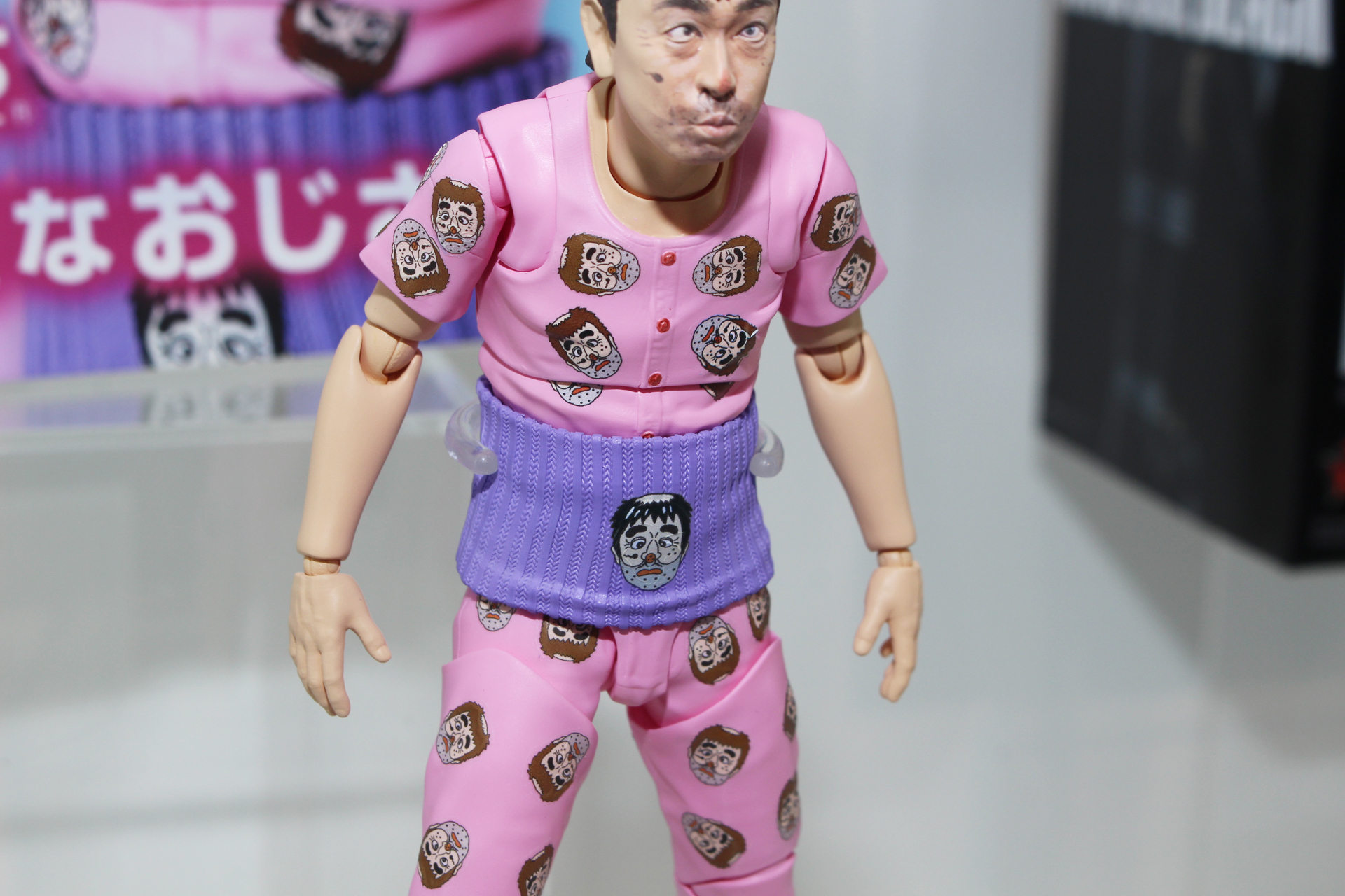 無数にプリントされた変なおじさんマーク