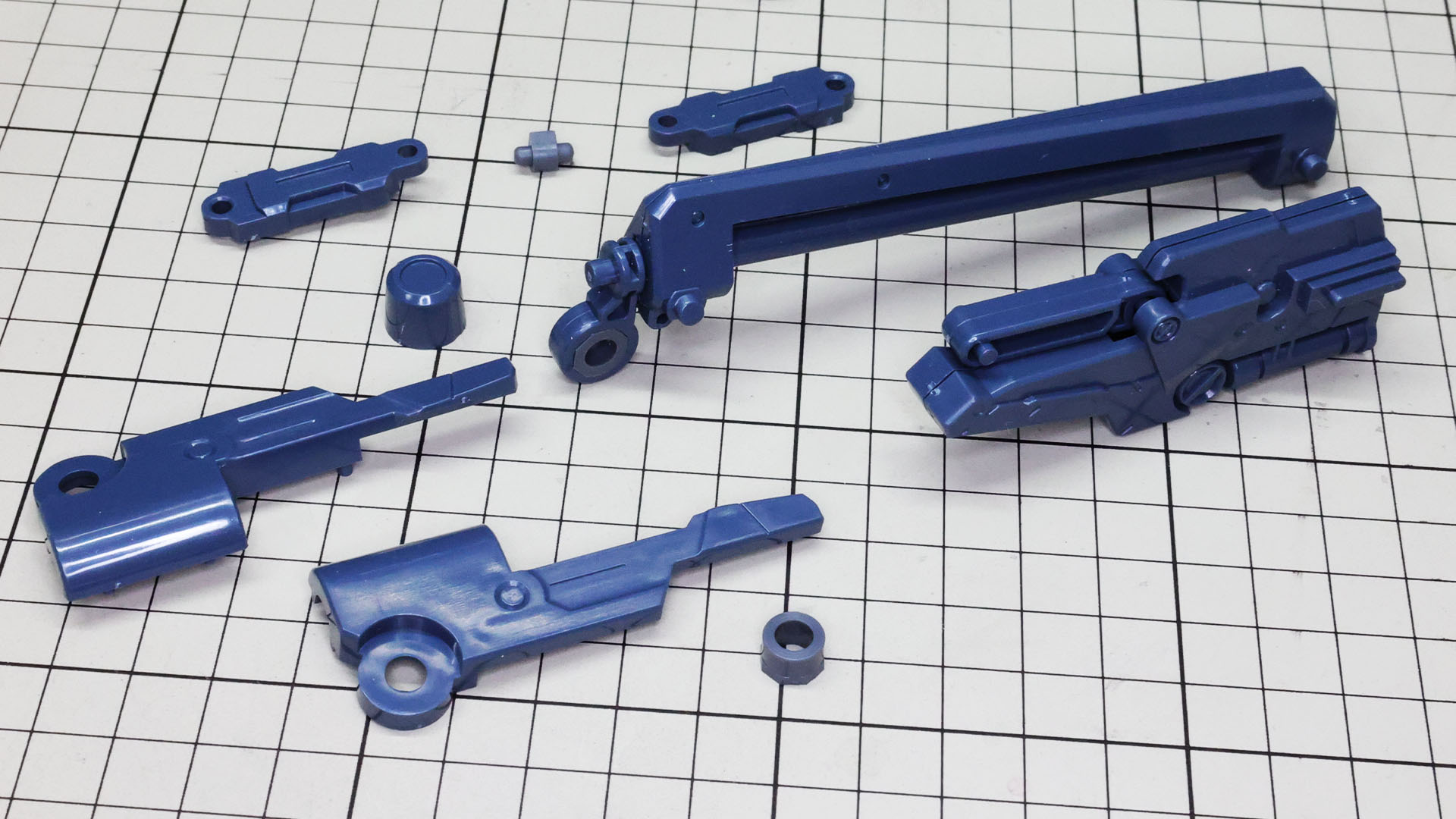 レールにアーム基部を組付けます。スライド軸とアーム基部の機構が連動します