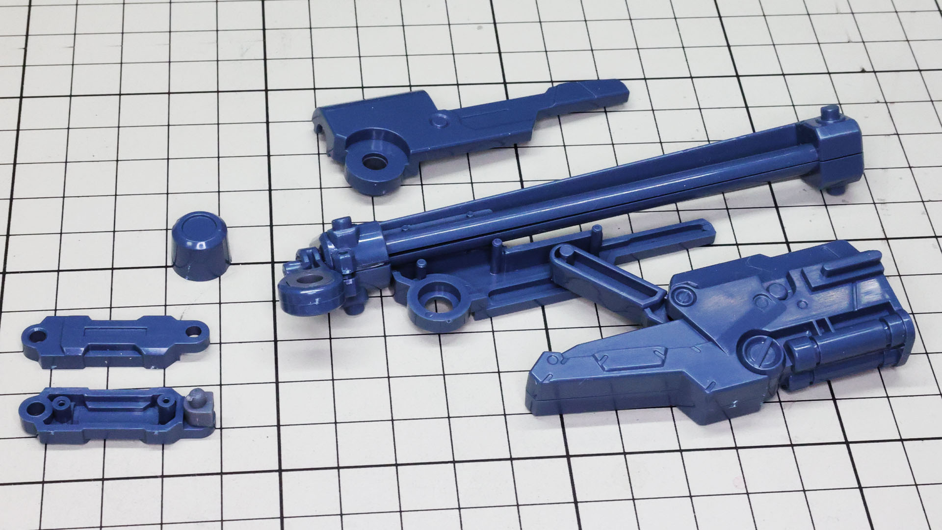 レールにアーム基部を組付けます。スライド軸とアーム基部の機構が連動します