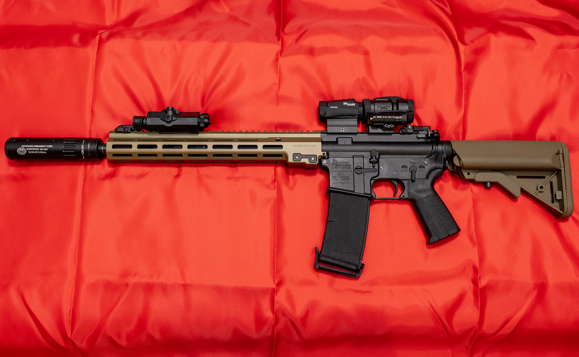 今回紹介する筆者の「タニオコバM4～プロジェクトM4カスタム～」。「プロジェクトM4」というショップのカスタムモデルで、筆者はこちらをオークションサイトで出会い、入手することができ、さらにカスタマイズを行った。今回は筆者のカスタマイズモデルと、オリジナルのモデルガンを紹介したい