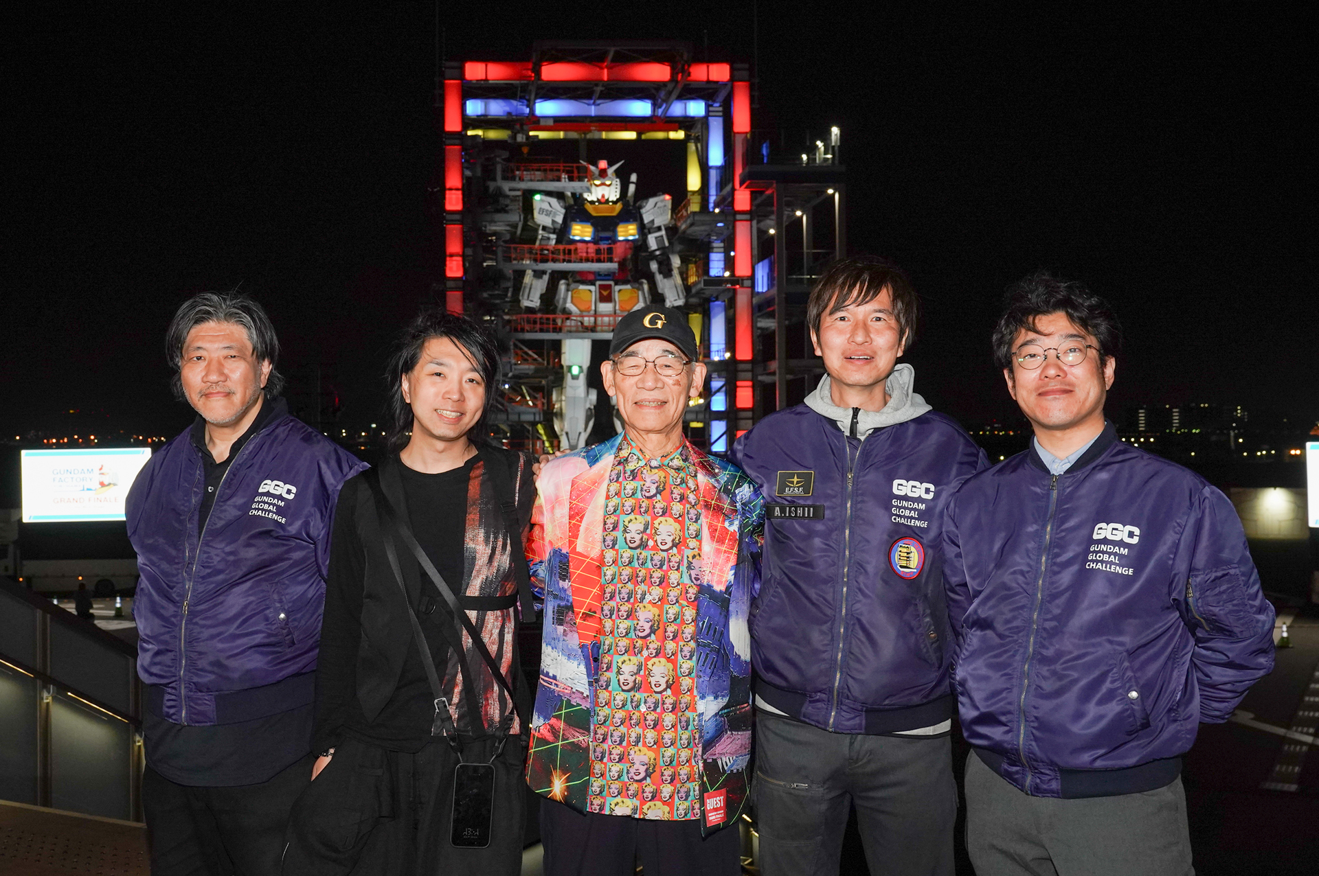 本日イベントにて登壇したGGC(ガンダムグローバルチャレンジ)クリエイティブディレクターの川原氏、メディアアーティストの落合陽一氏、富野由悠季氏、テクニカルディレクター石井氏、システムディレクター吉崎氏