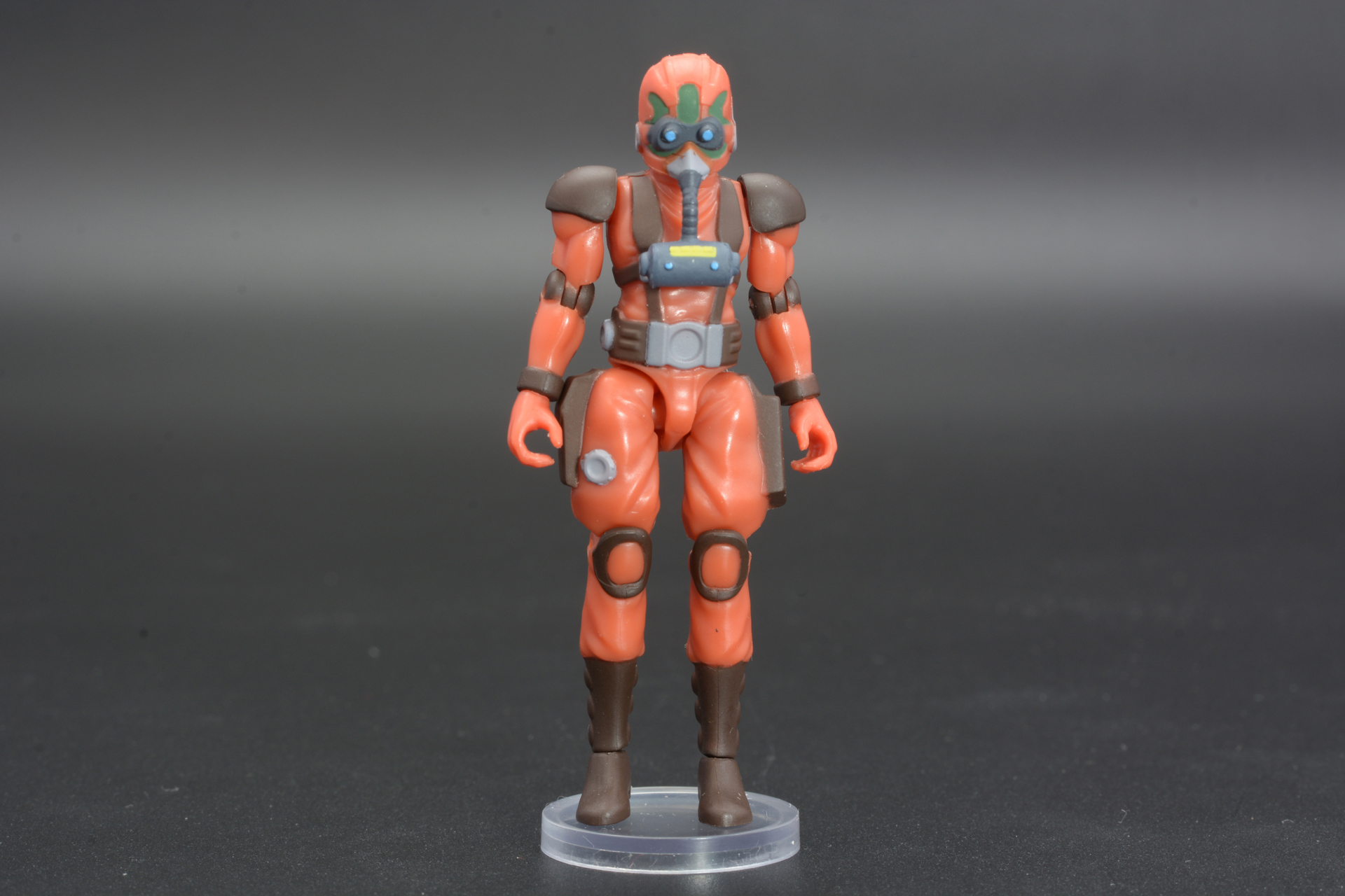 フィギュアモチーフは主人公キリコ・キュービィーだが、耐圧服を着て、ヘルメットをかぶった姿は、一般兵と見分けがつかない。量産機に乗る一般兵と同じ姿、というのが「ボトムズ」の面白さの1つである