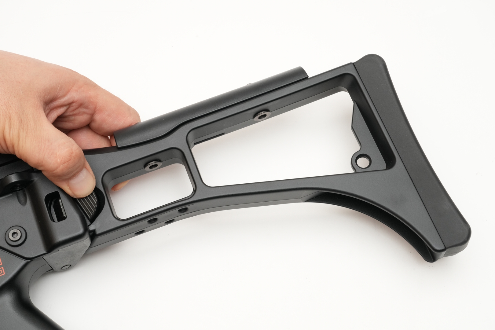 ストックロックボタンを押すと固定が解除される