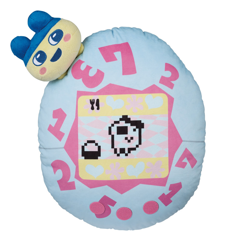 初代たまごっちからまめっちが飛び出たデザインのクッション