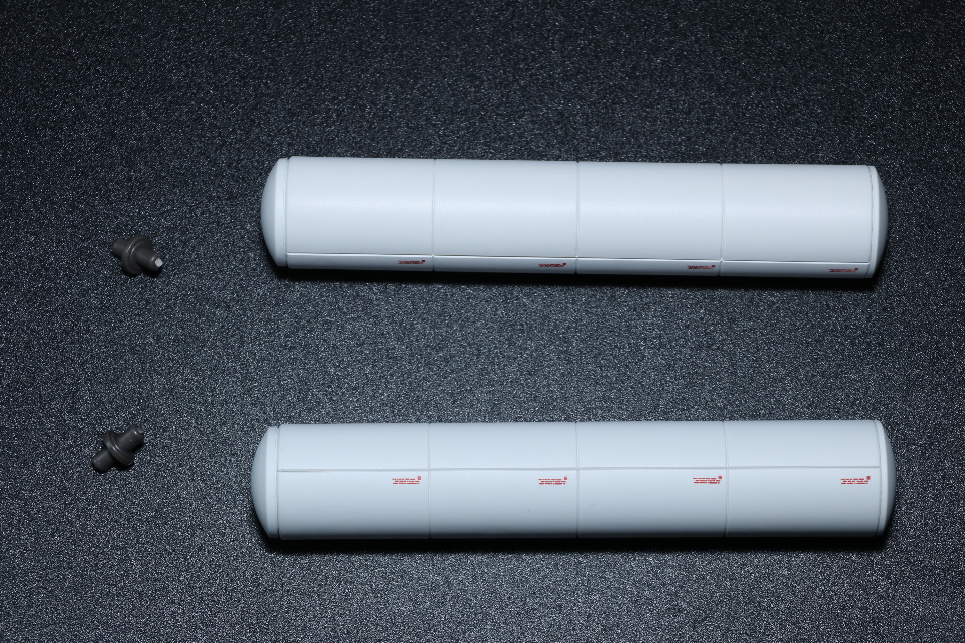 ブースター・ユニット、バックパックの基部（テールスタビライザー）、自動航行形態コネクター、ビーム・スマートガンを組み合わせることで完成