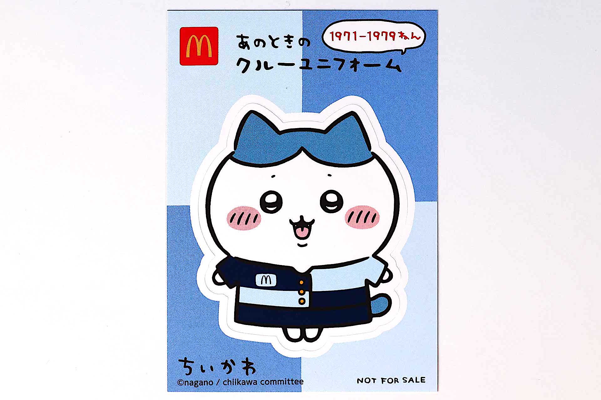 ハチワレが、1971年から1979年まで使われていたクルーの衣装に身を包んだ姿が描かれている