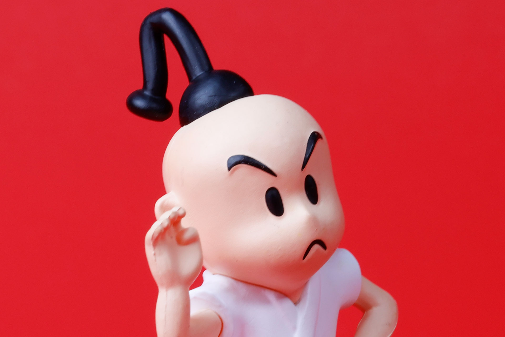 弁髪でまとめられた髪もプーの特徴のひとつだ