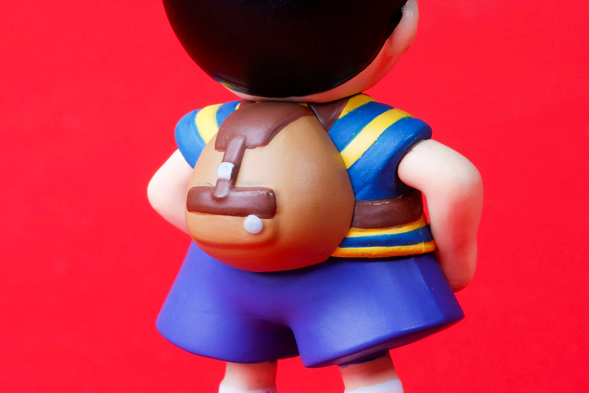 背中のリュックは少し小ぶりに見える