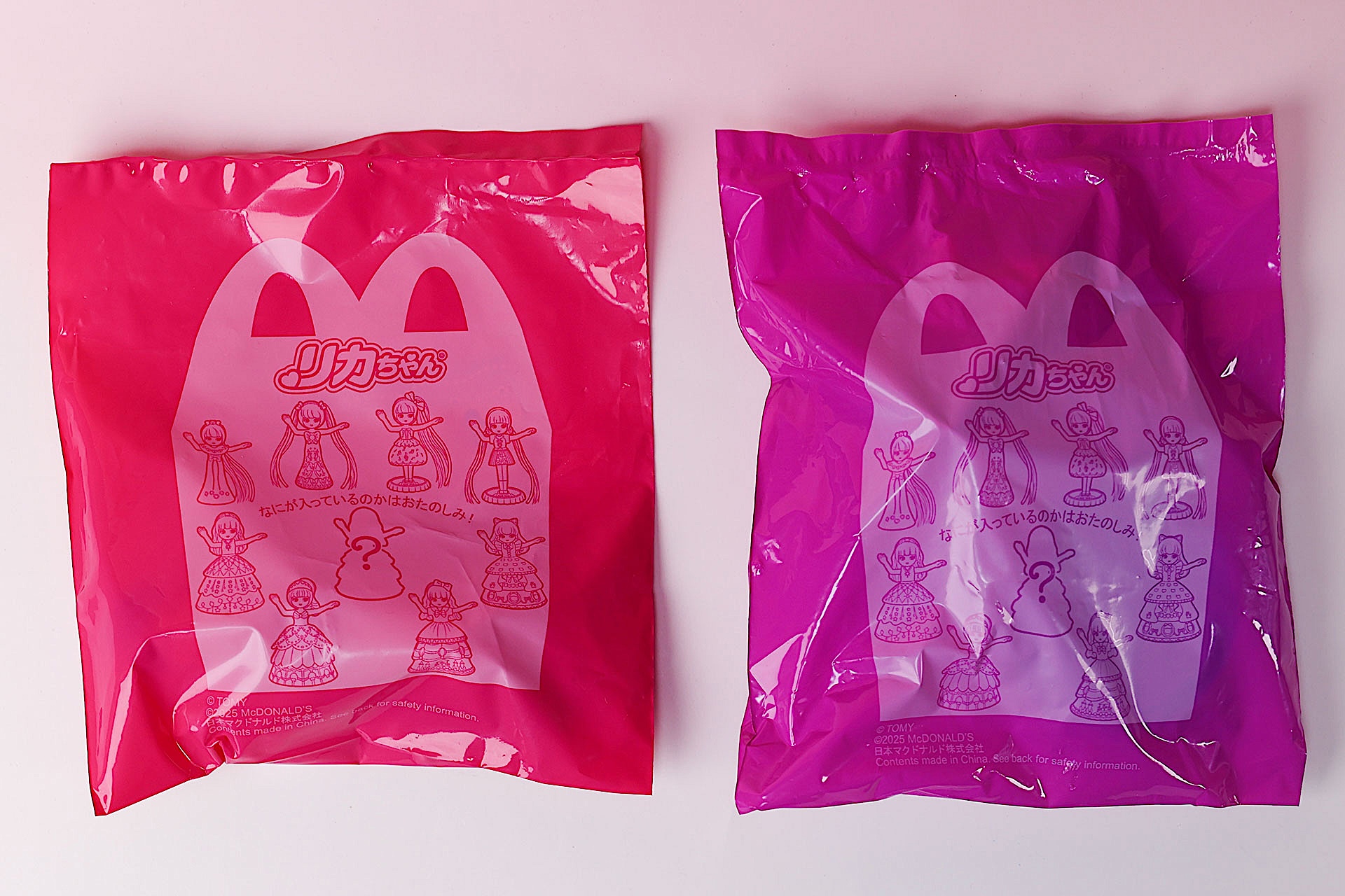 こちらが今回のおもちゃ袋。ピンク色が第1弾、紫色が第2弾だ