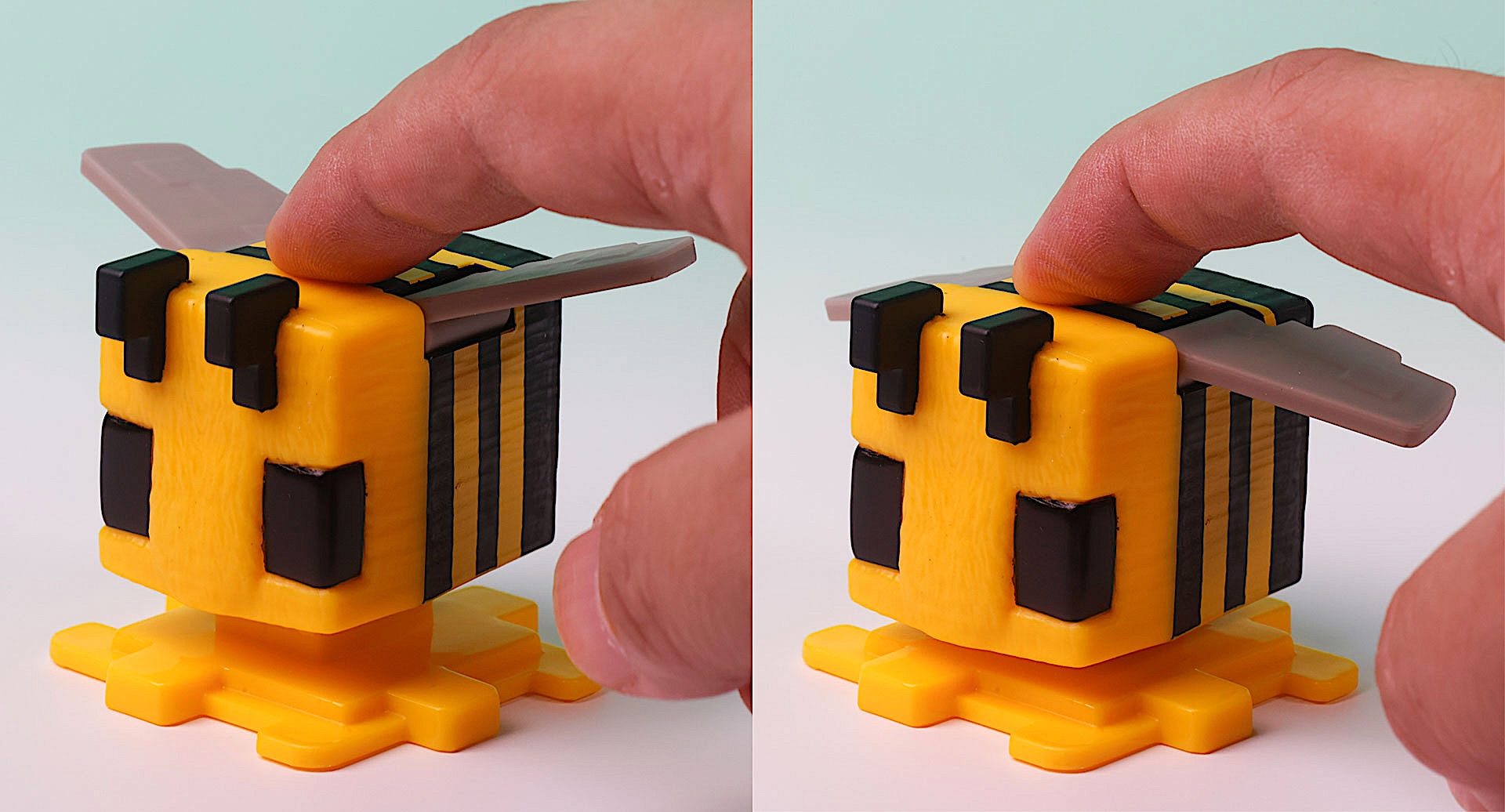 背中を押すと羽根が連動して動く