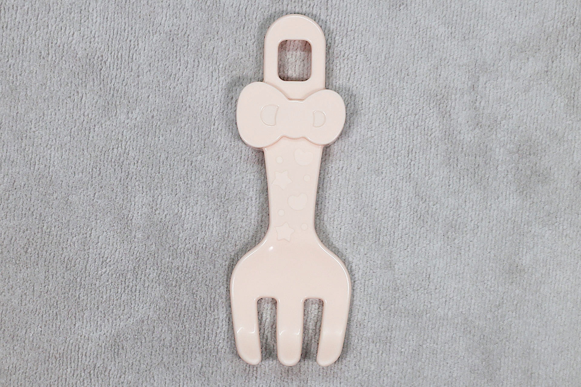 ハローキティのリボンが取っ手部分に付けられている