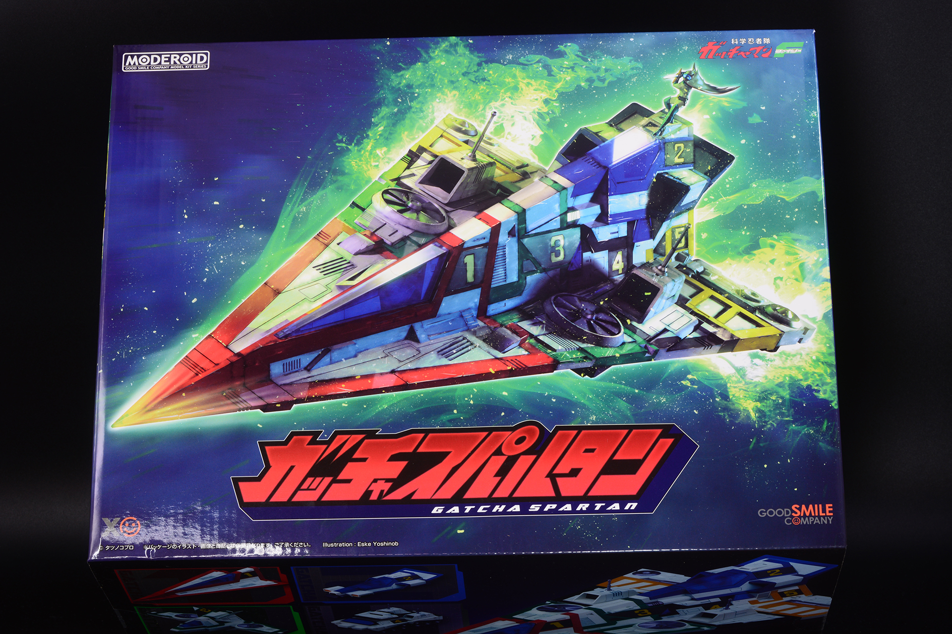 「MODEROID ガッチャスパルタン」のボックスアート。機体から発生する「デルタパワーフィールド」と健の持つ「ガッチャマンフェンサー」を連動させ、敵を切り裂く「科学忍法ハイパーシュート」をイメージしたイラストだ