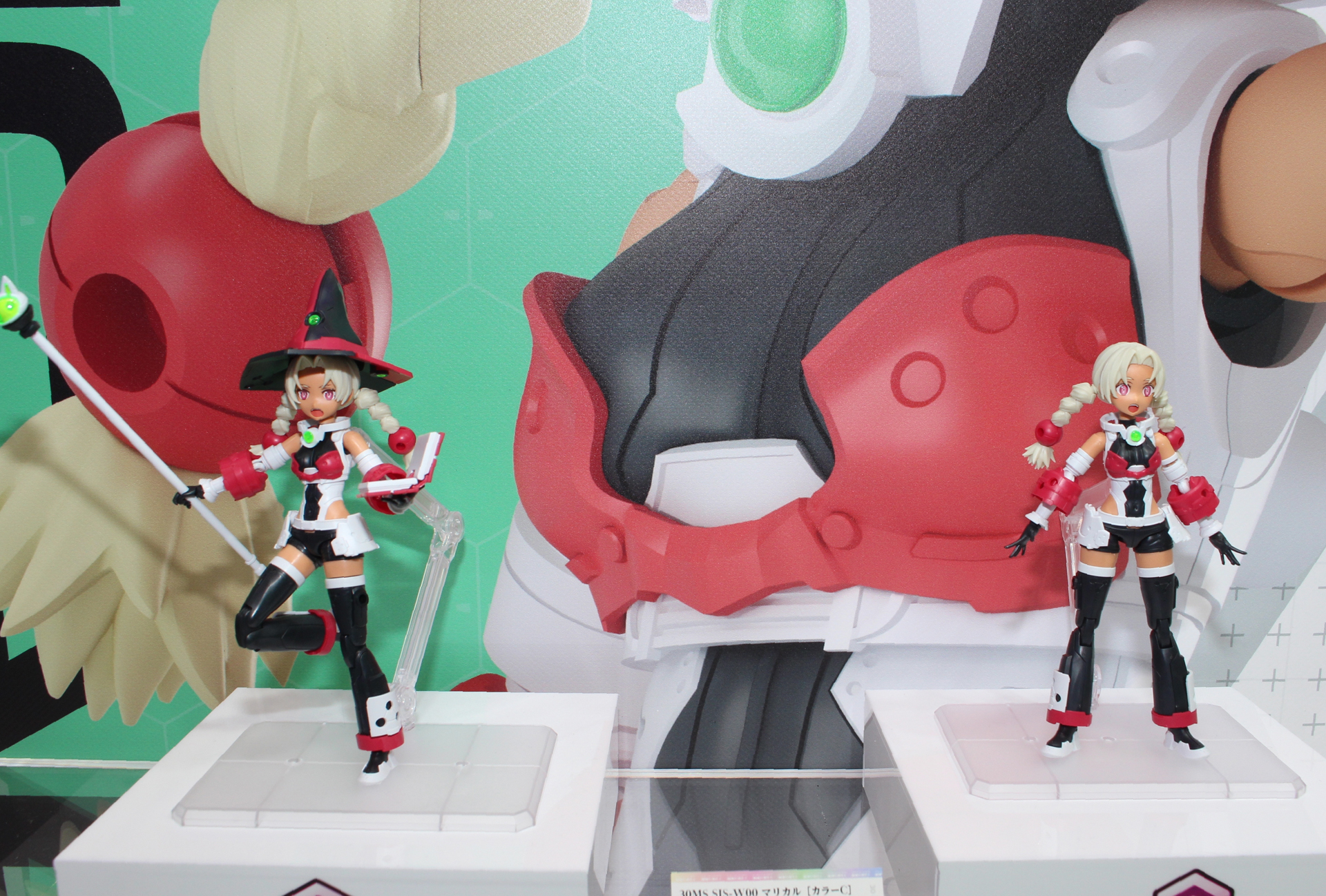 「30MS SIS-W00 マリカル[カラーC]」。とんがり帽子に魔導書、ロッドを装備した魔法使いのようなシスター