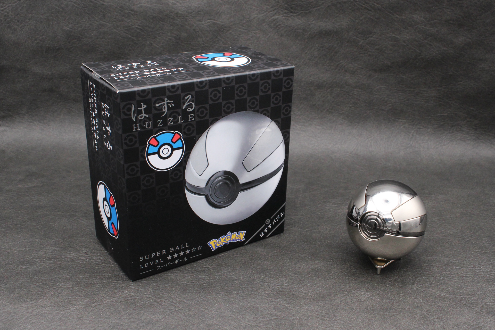 はずる　ポケットモンスター　スーパーボール。難易度LEVEL4。本体上側に2本の太めのライン模様が入っている。模様部分はマット仕上げだ