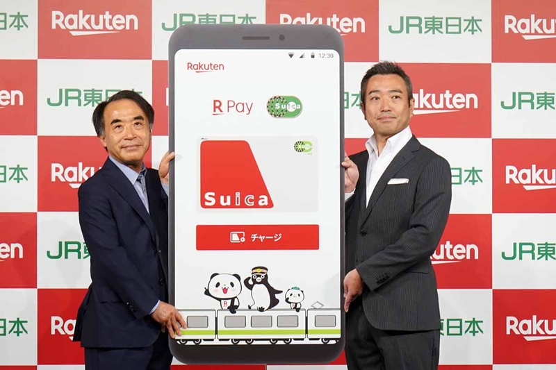 JR東日本 常務執行役員 IT・Suica事業本部長の野口忍氏(左)と、楽天ペイメント中村晃一社長(右)