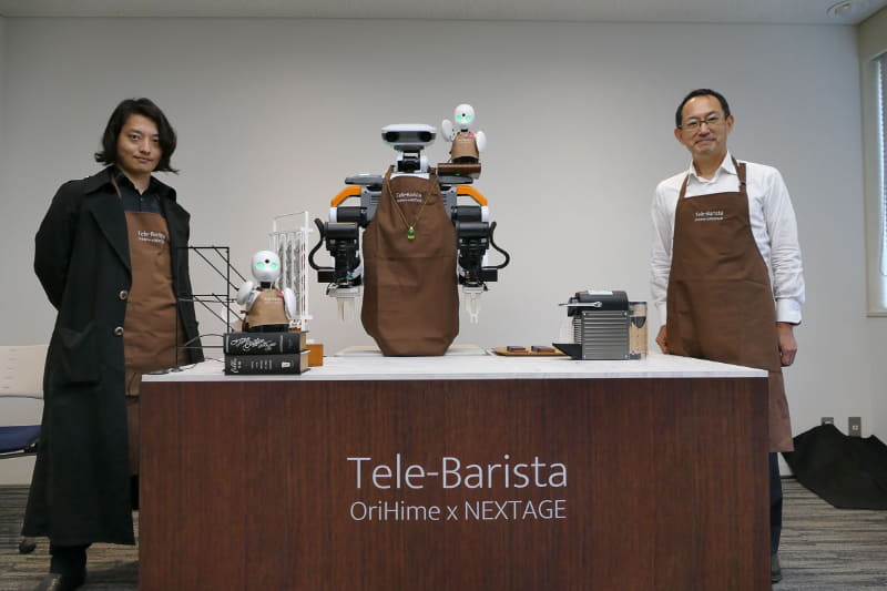 オリィ研究所 代表取締役 CEOの吉藤健太郎氏(左)と川田テクノロジーズ代表取締役社長 川田忠裕氏(右)