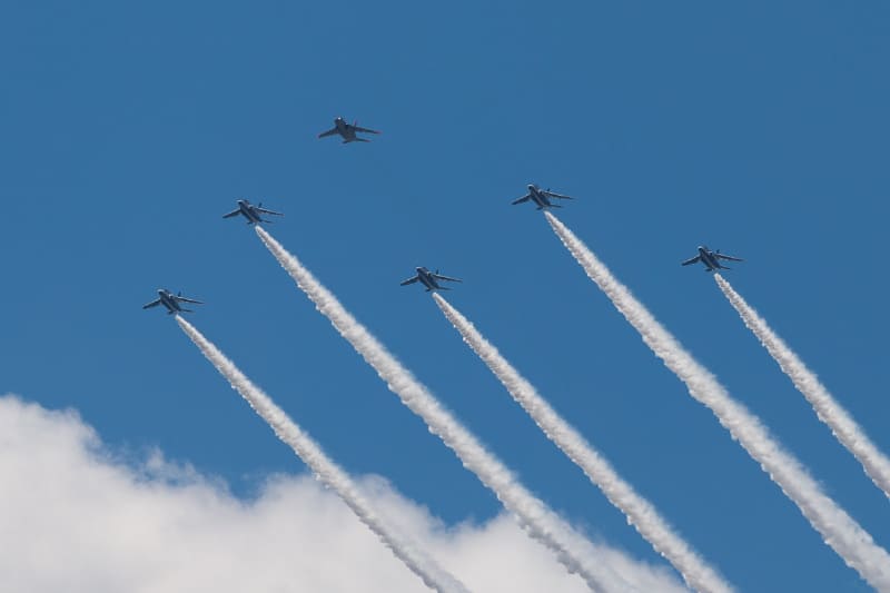 写真はオリンピック予行時のもの。本番ではカラースモークが使用される