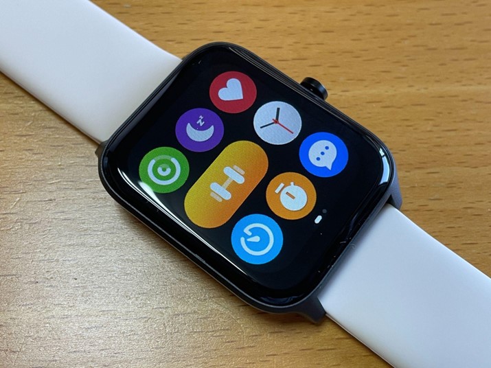 時計表示の状態でボタンを押すと主な機能にアクセスできる画面を表示(表示形態はグリッドおよびリストの2種類)