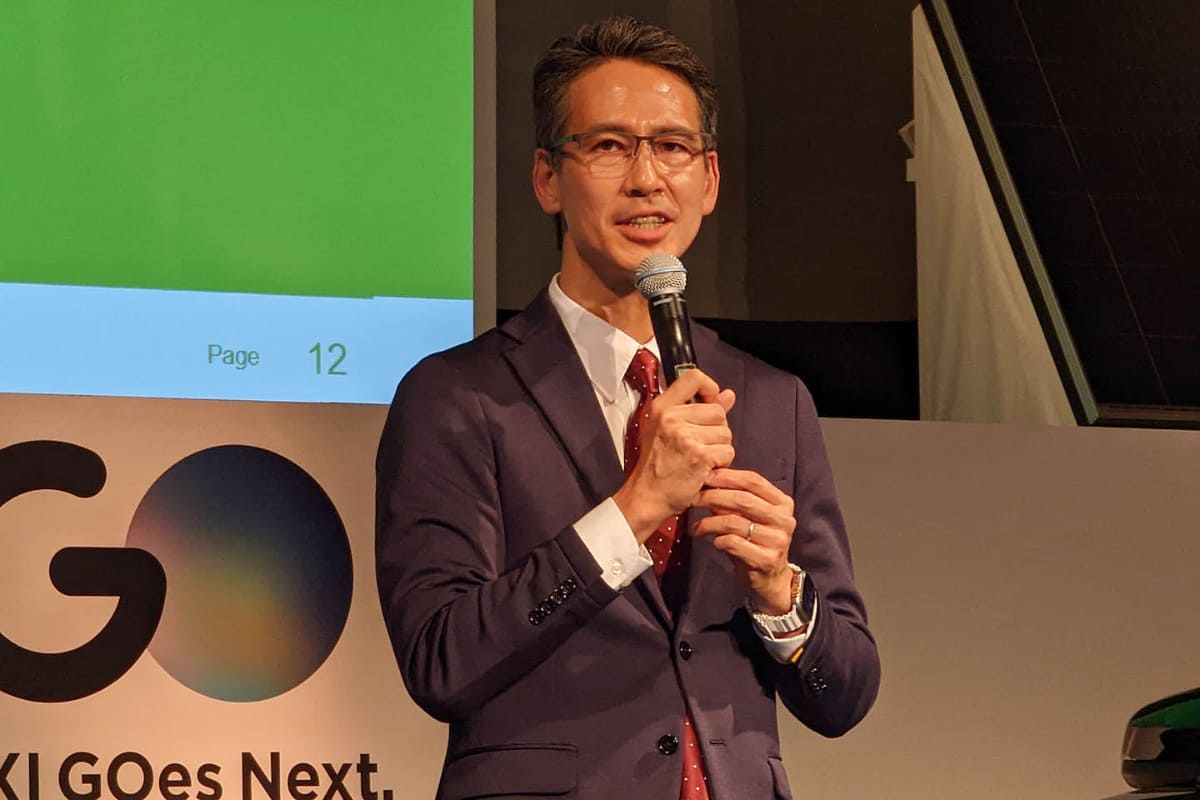 タクシー配車サービスGOのEVタクシー発表会にて挨拶する川鍋一朗氏