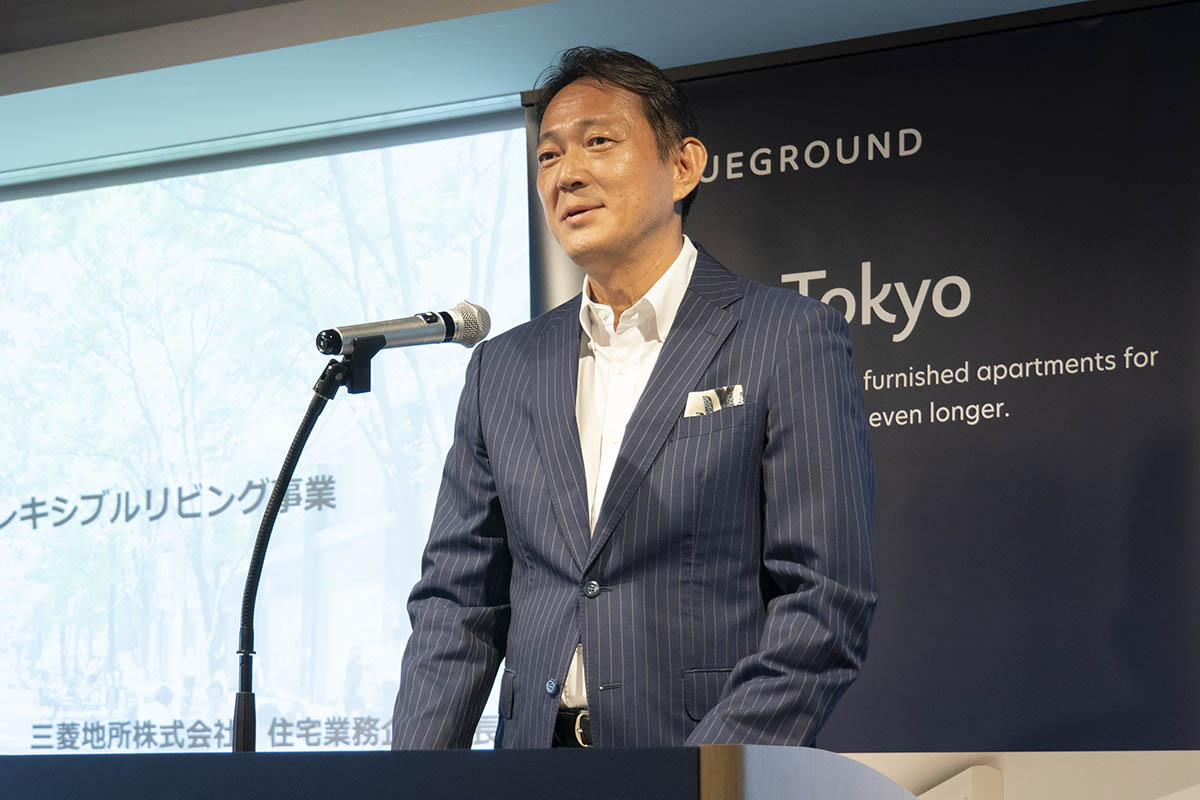 フレキシブルリビング事業に対する取り組みについて説明する三菱地所 住宅業務企画部長 鈴木智久氏