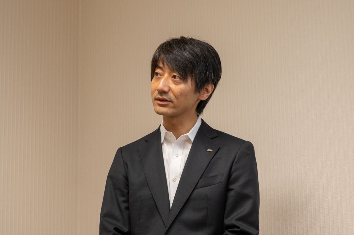 KDDI マーケティング本部 サービス推進部 部長の新井宏史氏
