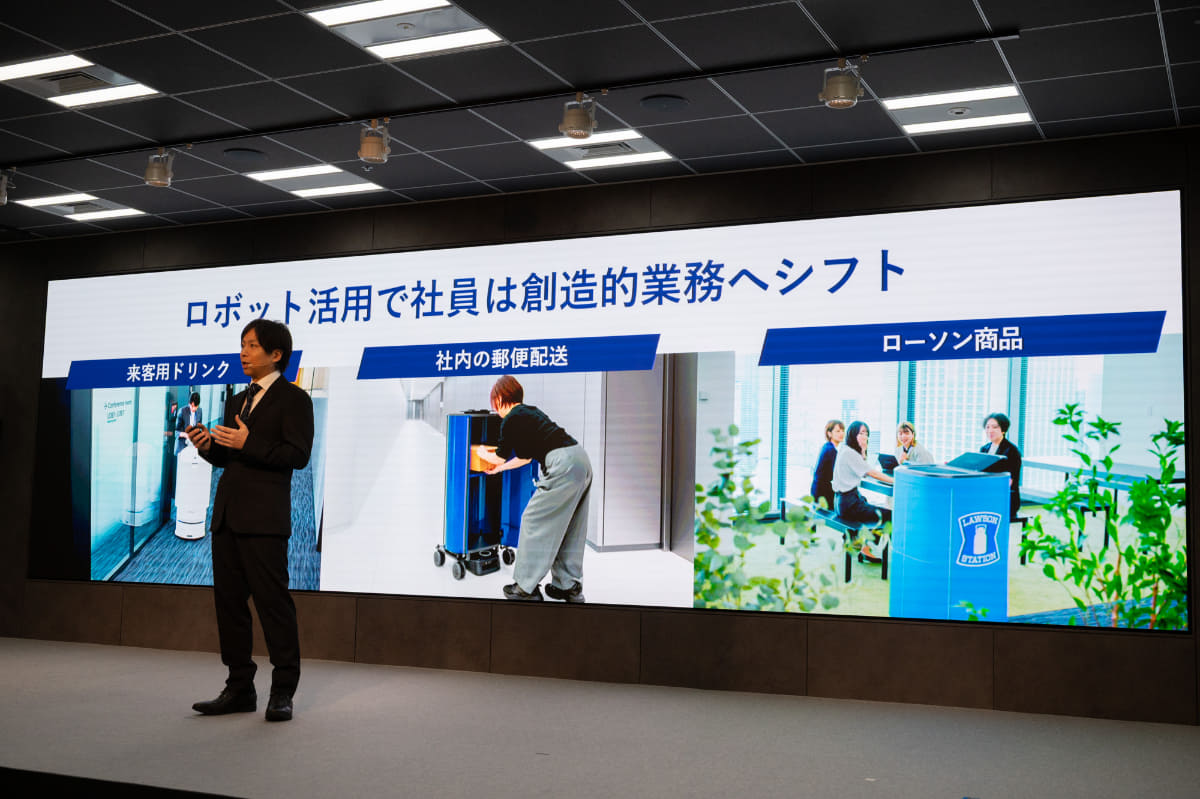 受付階の6階にあるローソンと連携、アプリで注文した商品を指定の場所まで配送するデリバリーロボット。入館ゲートやエレベーター、執務エリアへの自動ドアも通過できる