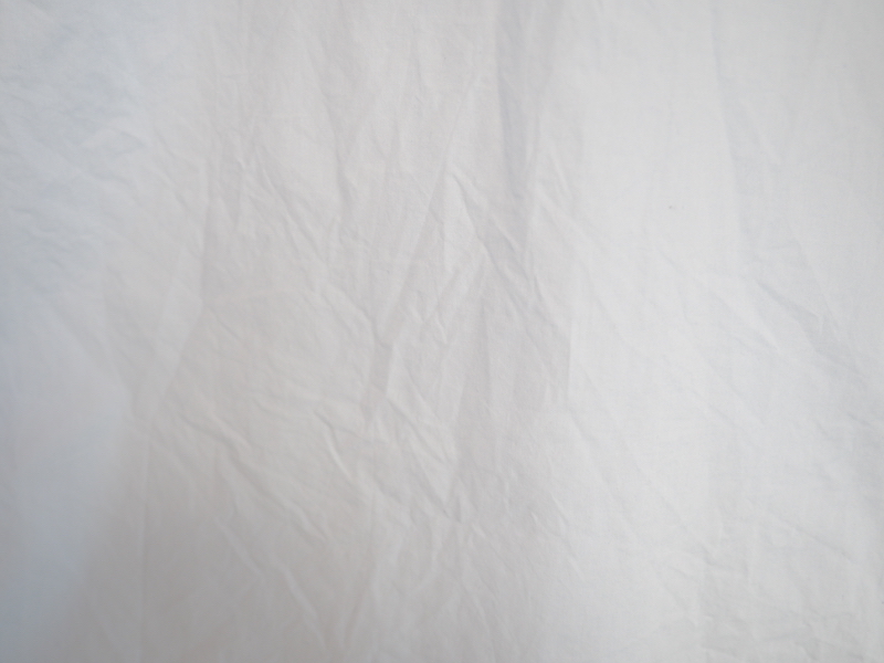 後ろ身頃のビフォー(写真左)とアフター(写真右)