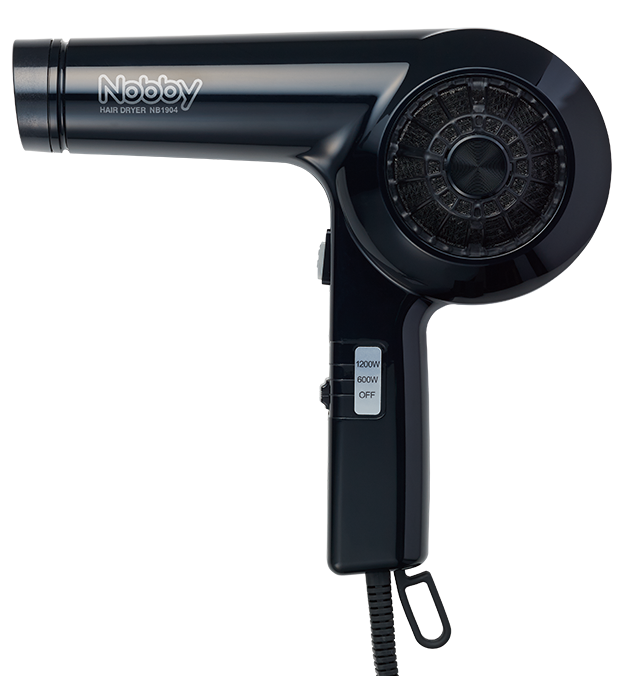 テスコムのサロン専用のドライヤーで一般には発売されていない製品。見るからにシンプル。人指し指がかかるボタンは一般では「ターボ」ボタンだったりするが、プロ用は「ヒーターを一瞬だけ切るスイッチ」。頻繁に温冷を変えるため、こんなスイッチがある