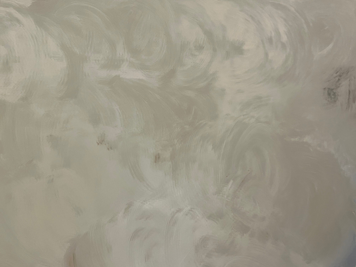 丸めたラップで塗り広げ……