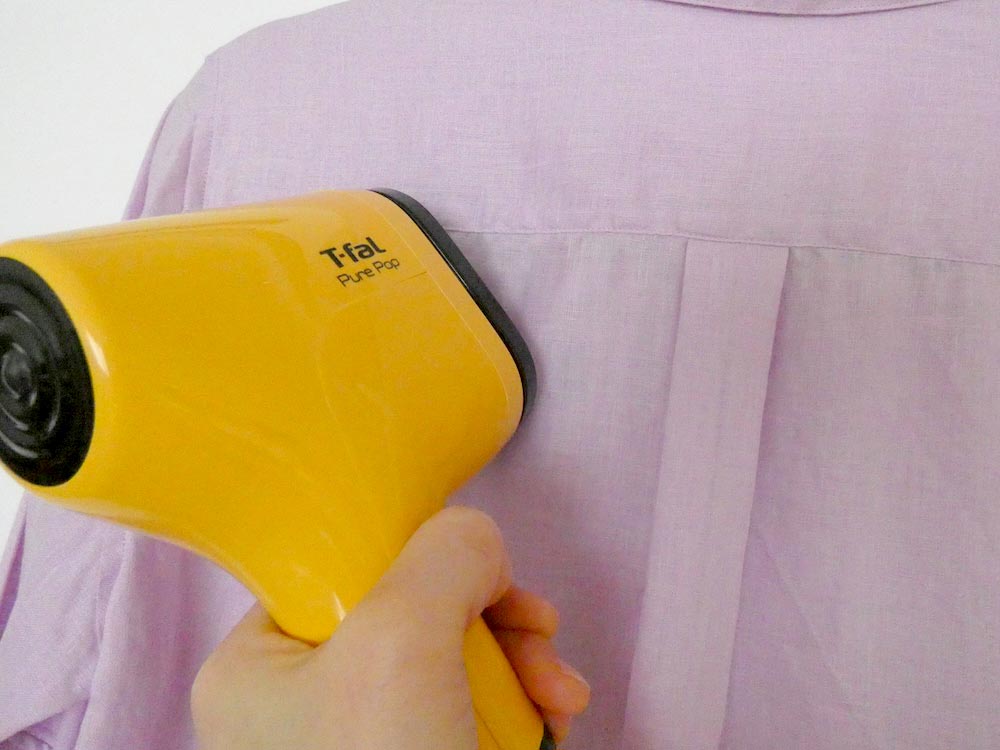 ハンドル部分を握ってスチームトリガーをひく