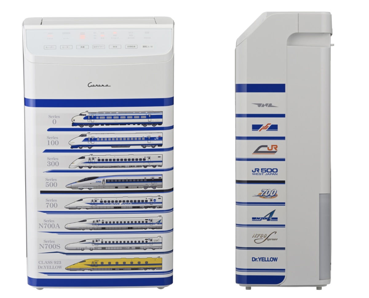 東海道新幹線の歴代車両を並べた特殊なシールを、手作業で丁寧に貼り付けている