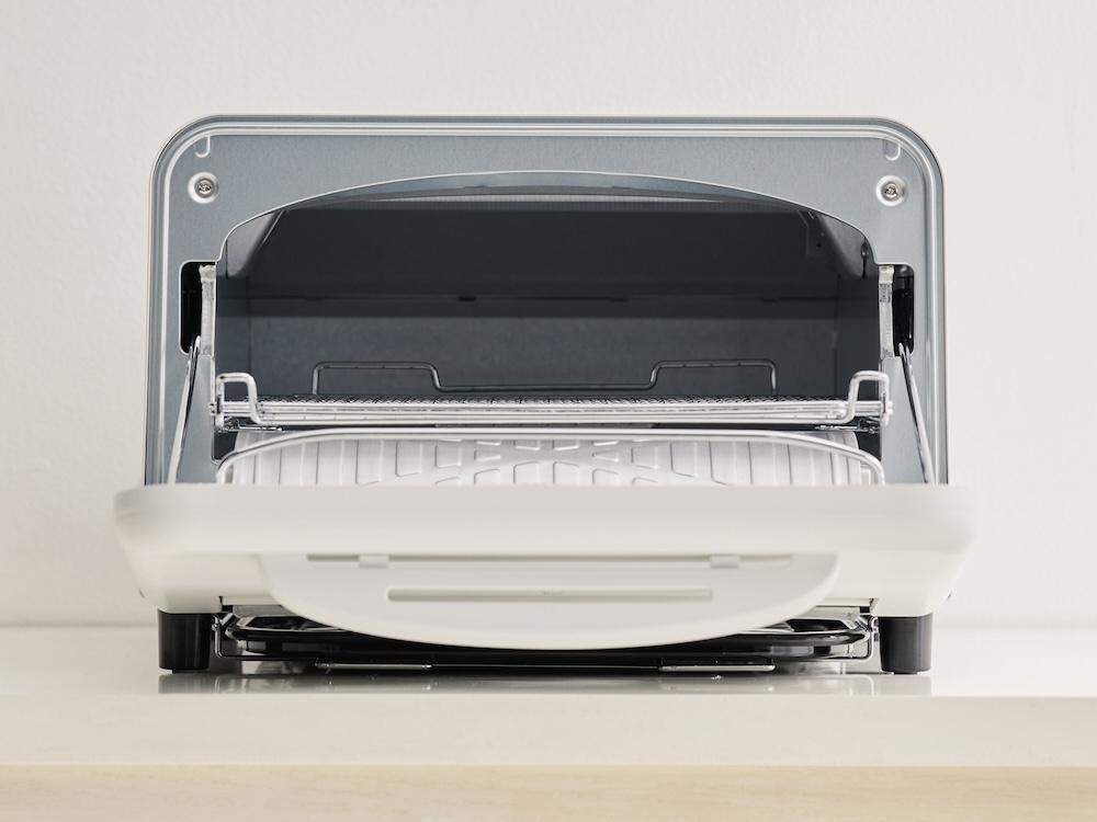 石窯を参考に、庫内の開口部をアーチ形状にしている