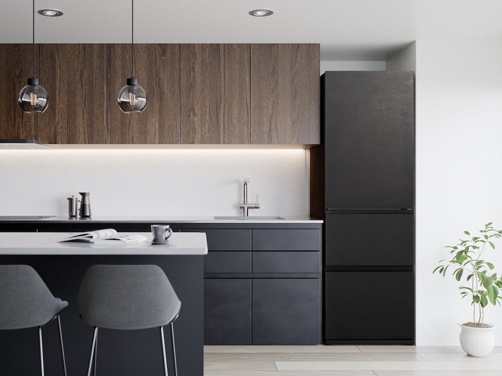 インテリア性のあるキッチン空間に馴染みやすいよう、石目調のガラス面材を採用