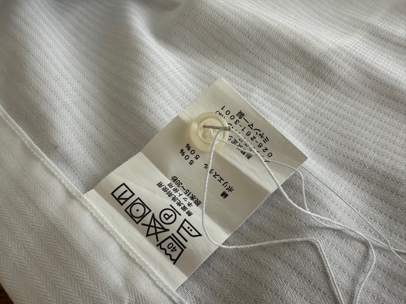 品質表示タグに縫い付けておくとわかりやすいです