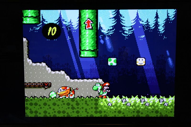 「ヨッシーアイランド」は恐竜ヨッシーが赤ちゃんマリオを背中に乗せて活躍するアクションゲームだ